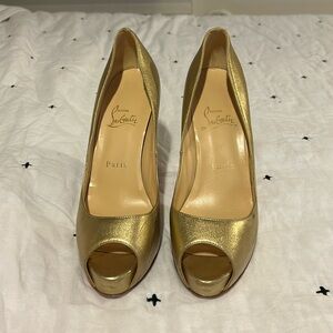 Louboutin gold peep-toe heels